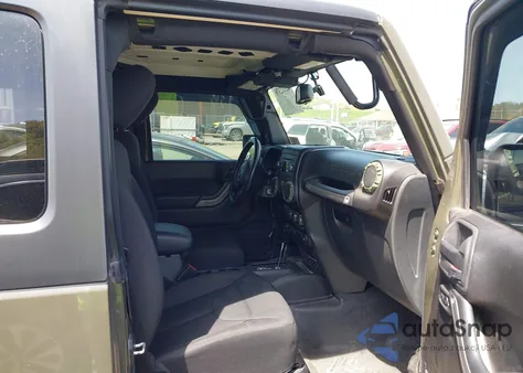 2015 Jeep Wrangler Willys Wheeler z USA, uszkodzony, nr VIN 1C4AJWAG1FL714131